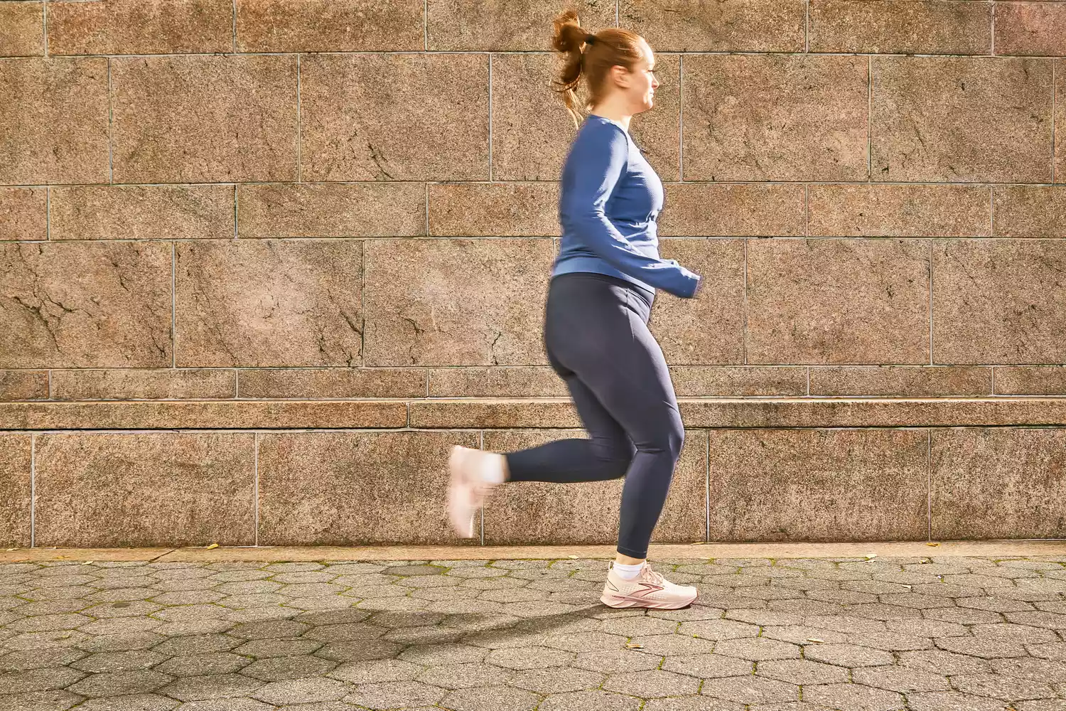 A person running outdoors wearing the Brooks Levitate 6