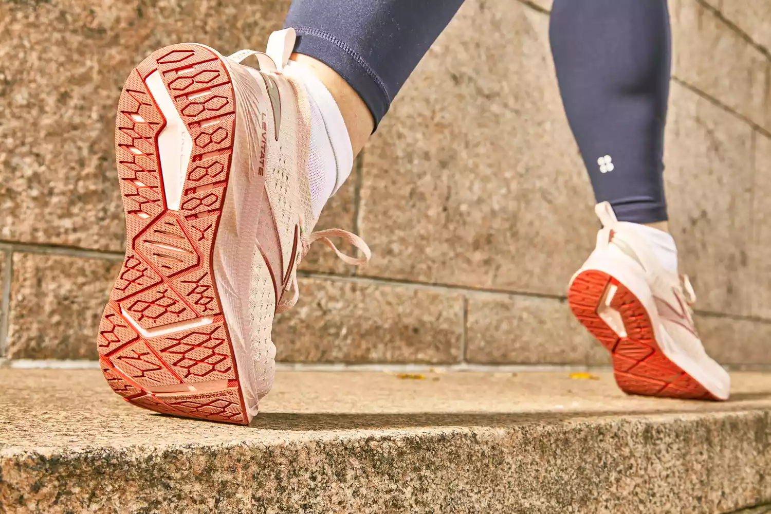 A person running outdoors wearing the Brooks Levitate 6