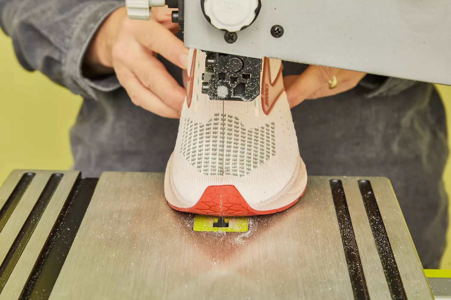 Brooks Levitate 6 being cut in half with a saw