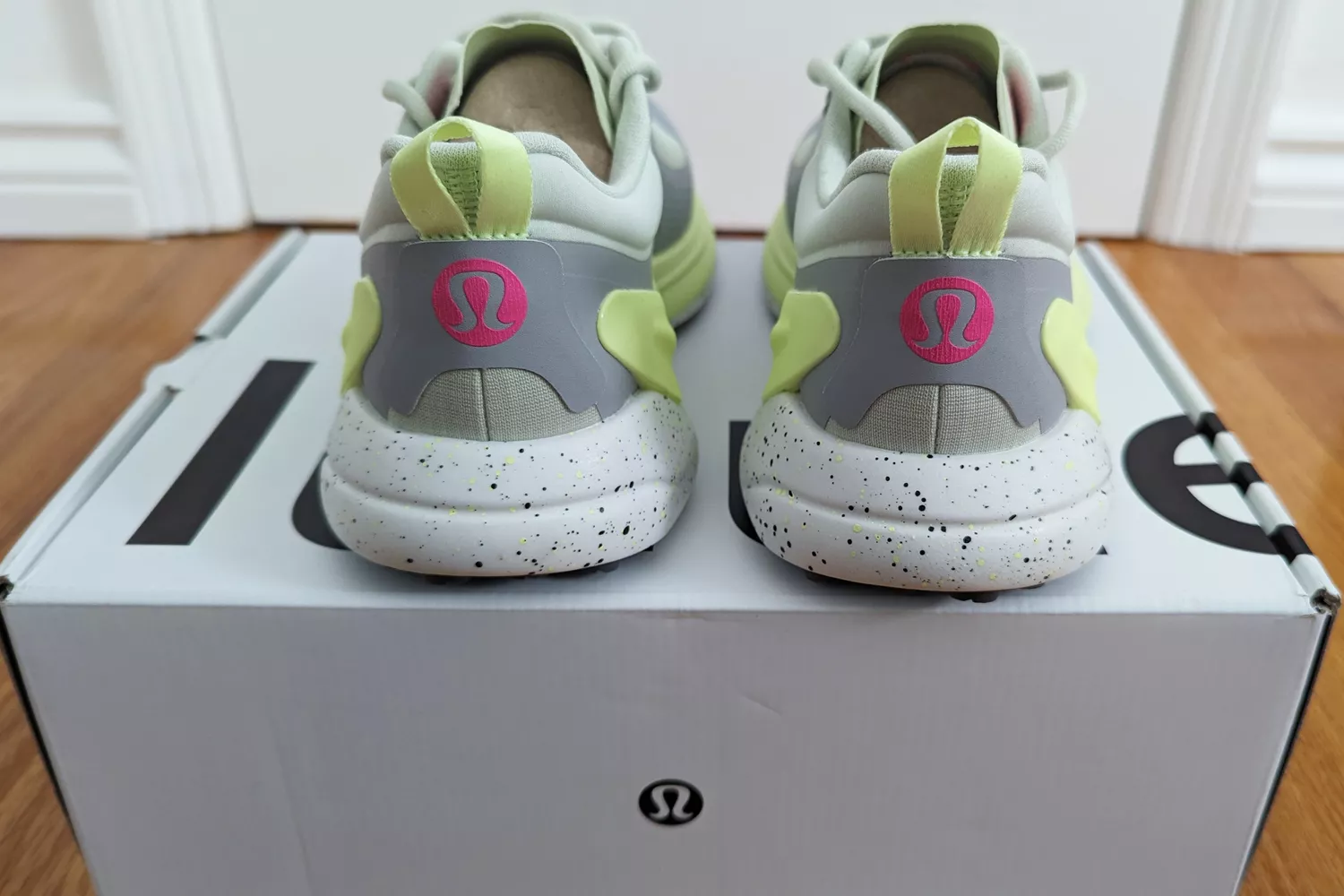 Lululemon Blissfeel Trail Running Shoe on top of box