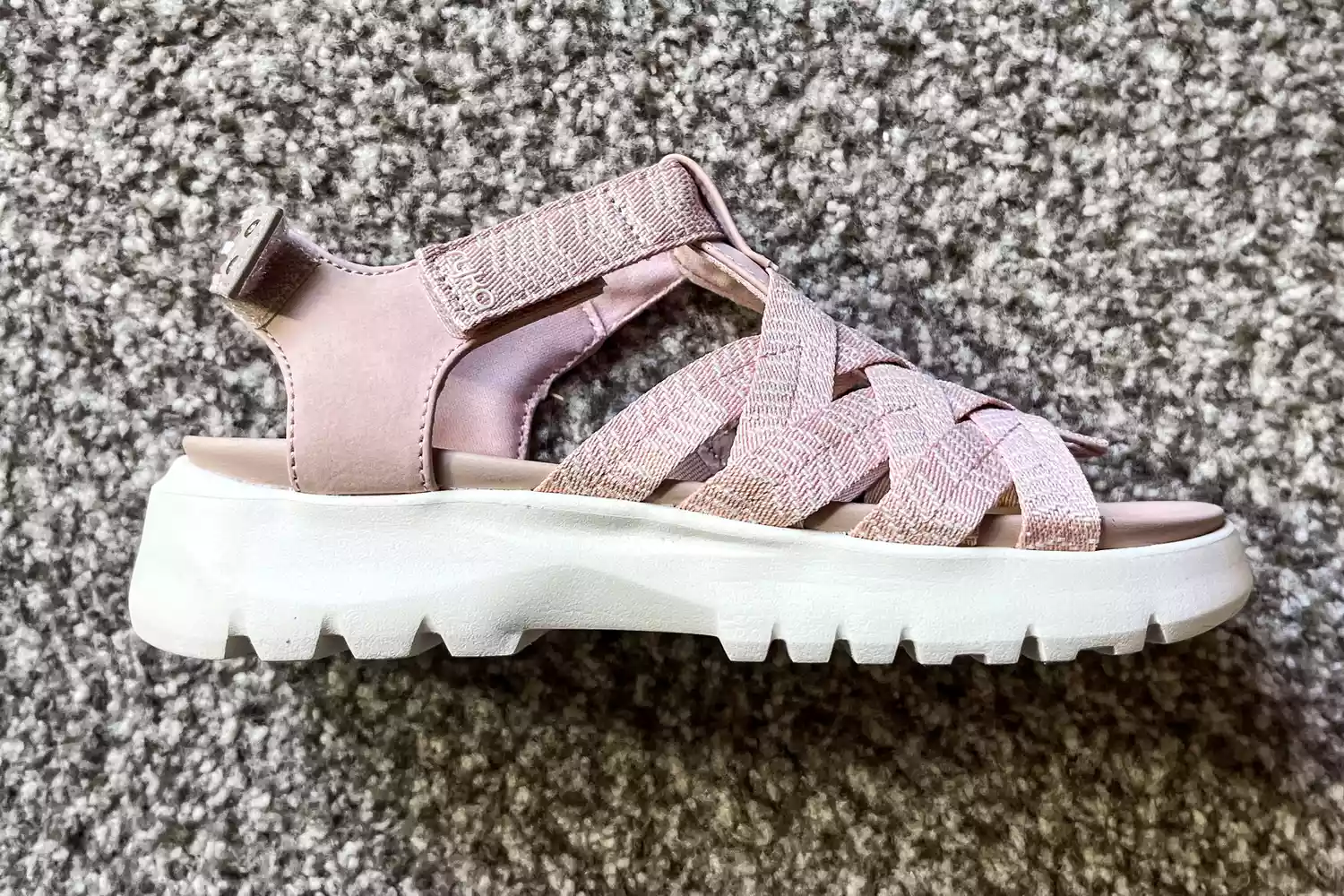 A Rykä Blissful Strappy Sandal on its side