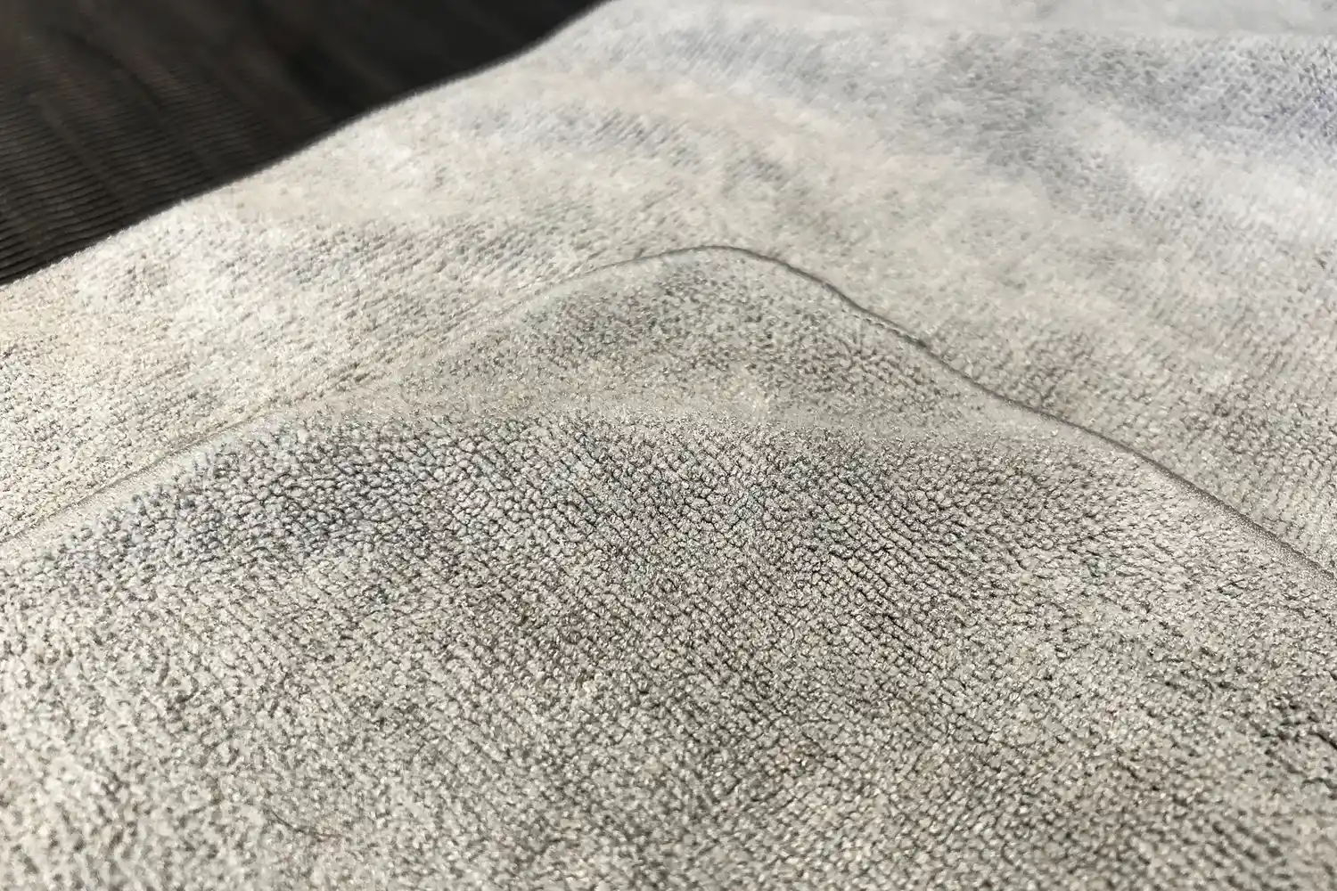 A close-up of the texture of the fabric on the S&T INC. Microfiber Sweat Gym Towel