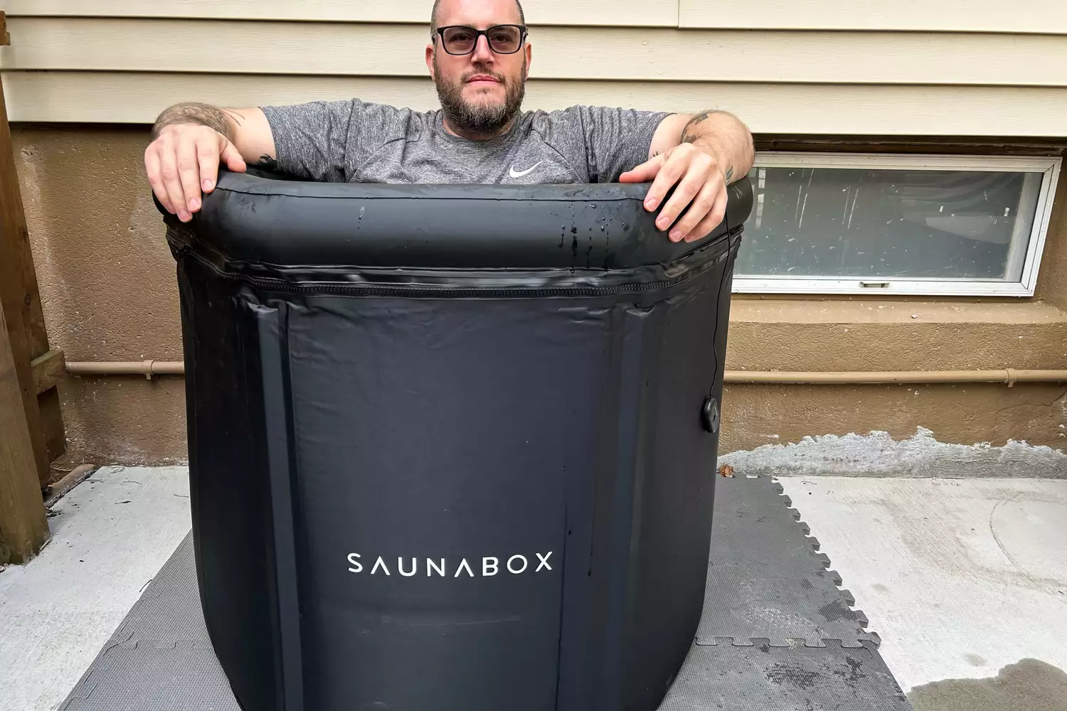 A person sitting in the Saunabox PlungeBox Pro