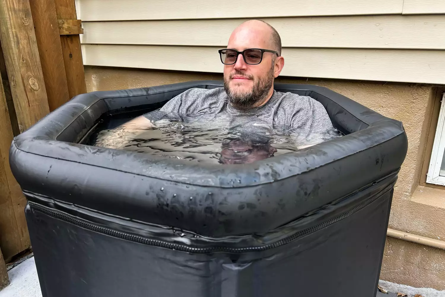 A person sitting in the Saunabox PlungeBox Pro
