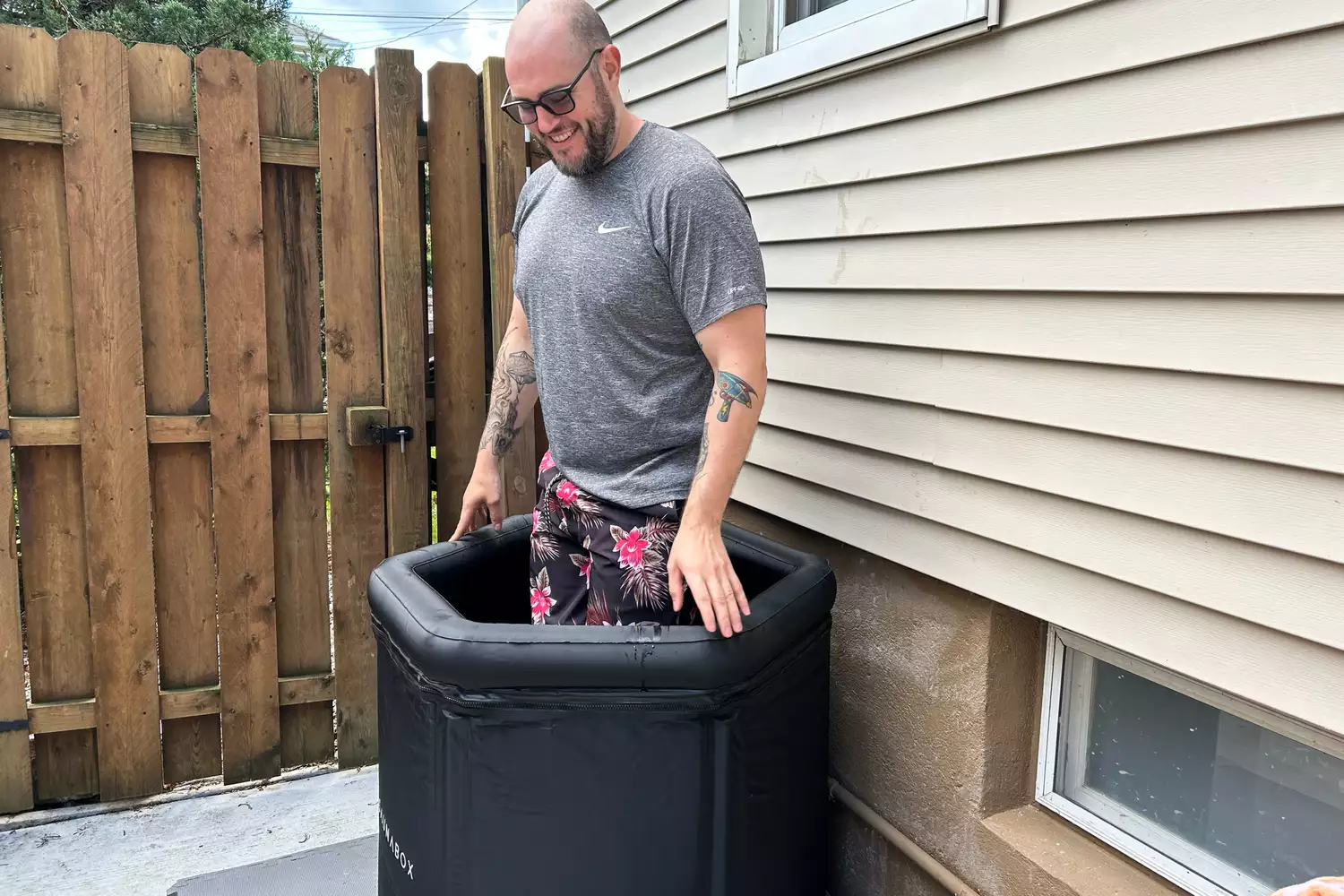 A person getting into the Saunabox PlungeBox Pro