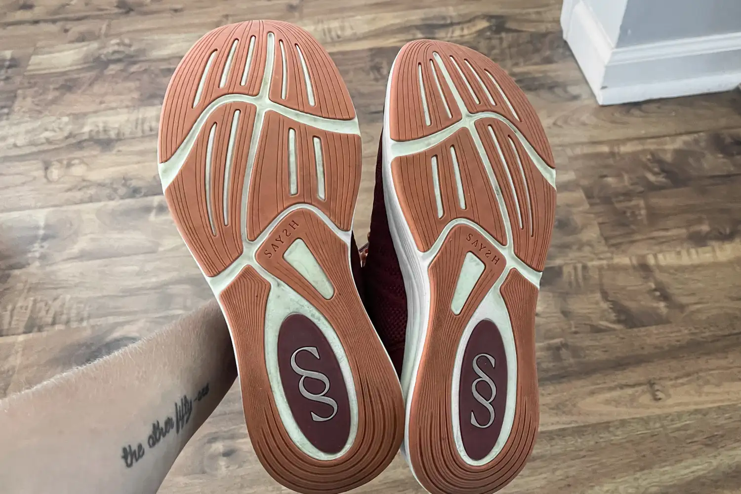 The treads on the bottom of the Saysh Women's The Felix Runner Performance Running Shoes