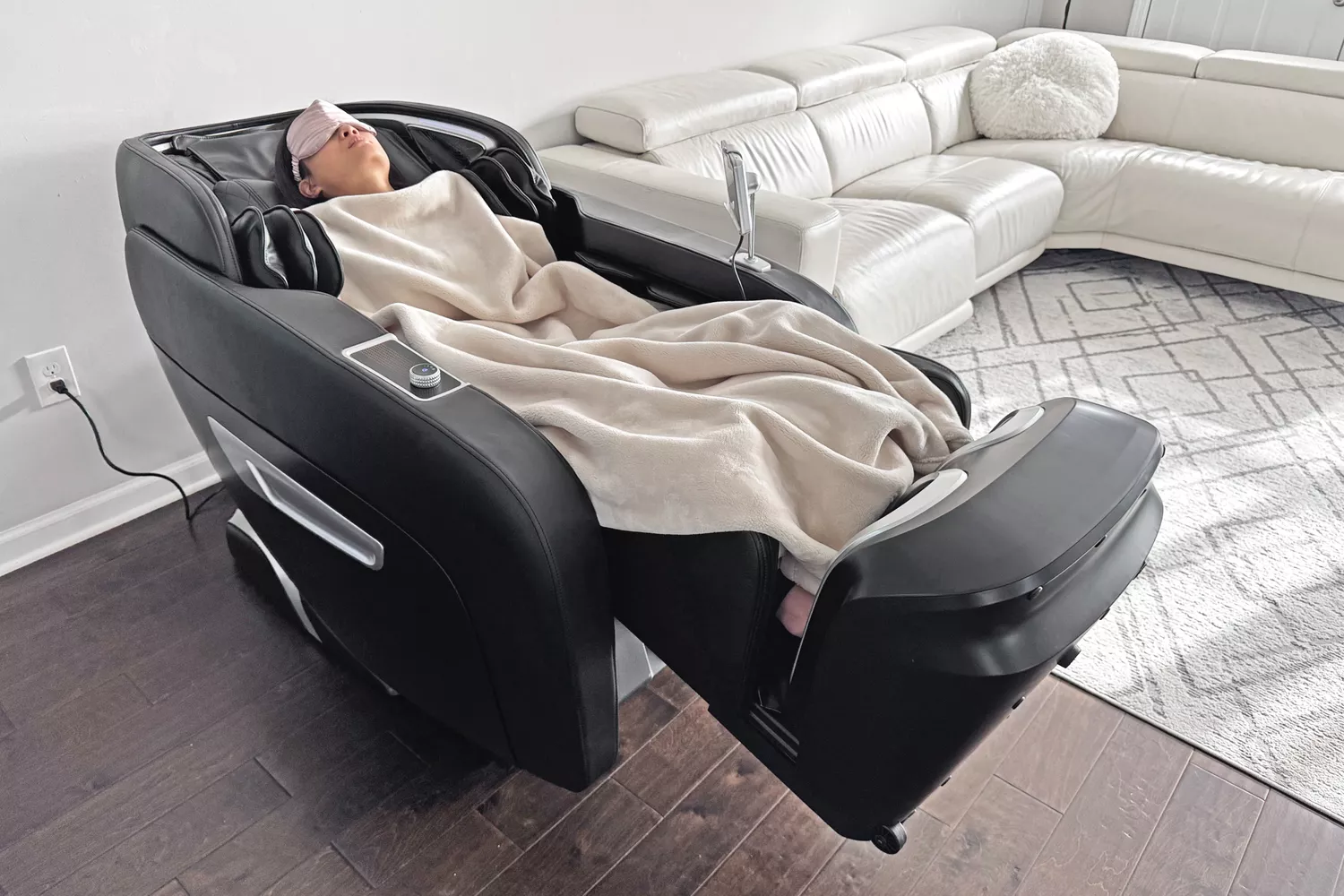 A person relaxing in the SCS Make Life Easy Lifesmart R775W 4D Massage Chair