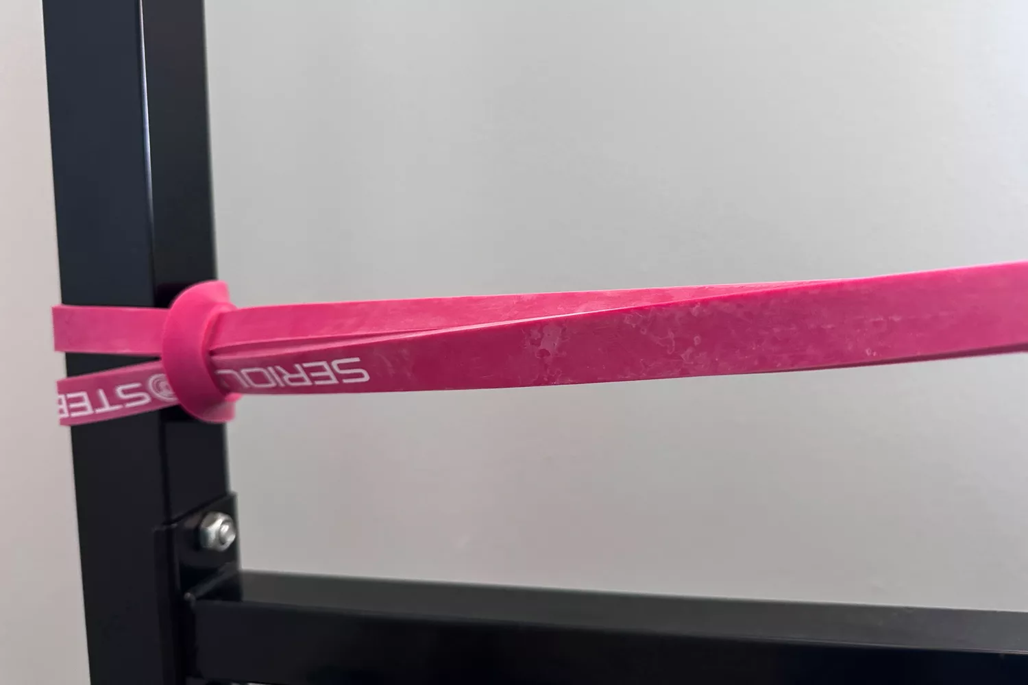 The Serious Steel 41 Heavy Duty Resistance Bands tied around a pole