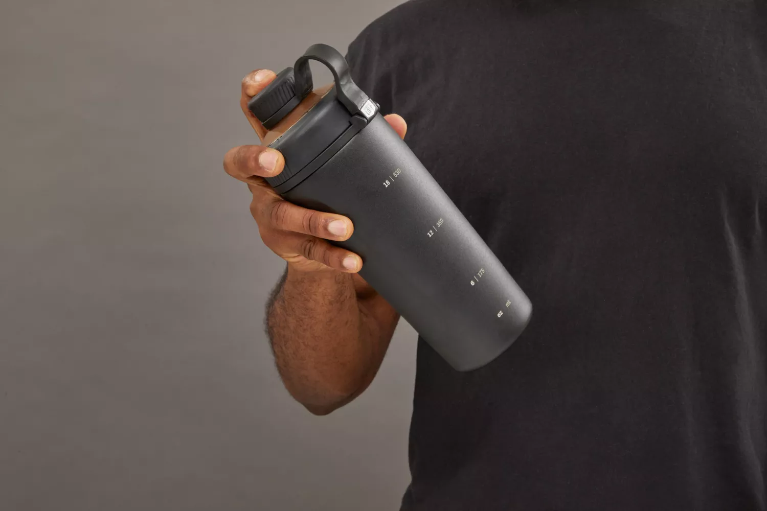 Person holding BlenderBottle Radian 26 oz Shaker Cup