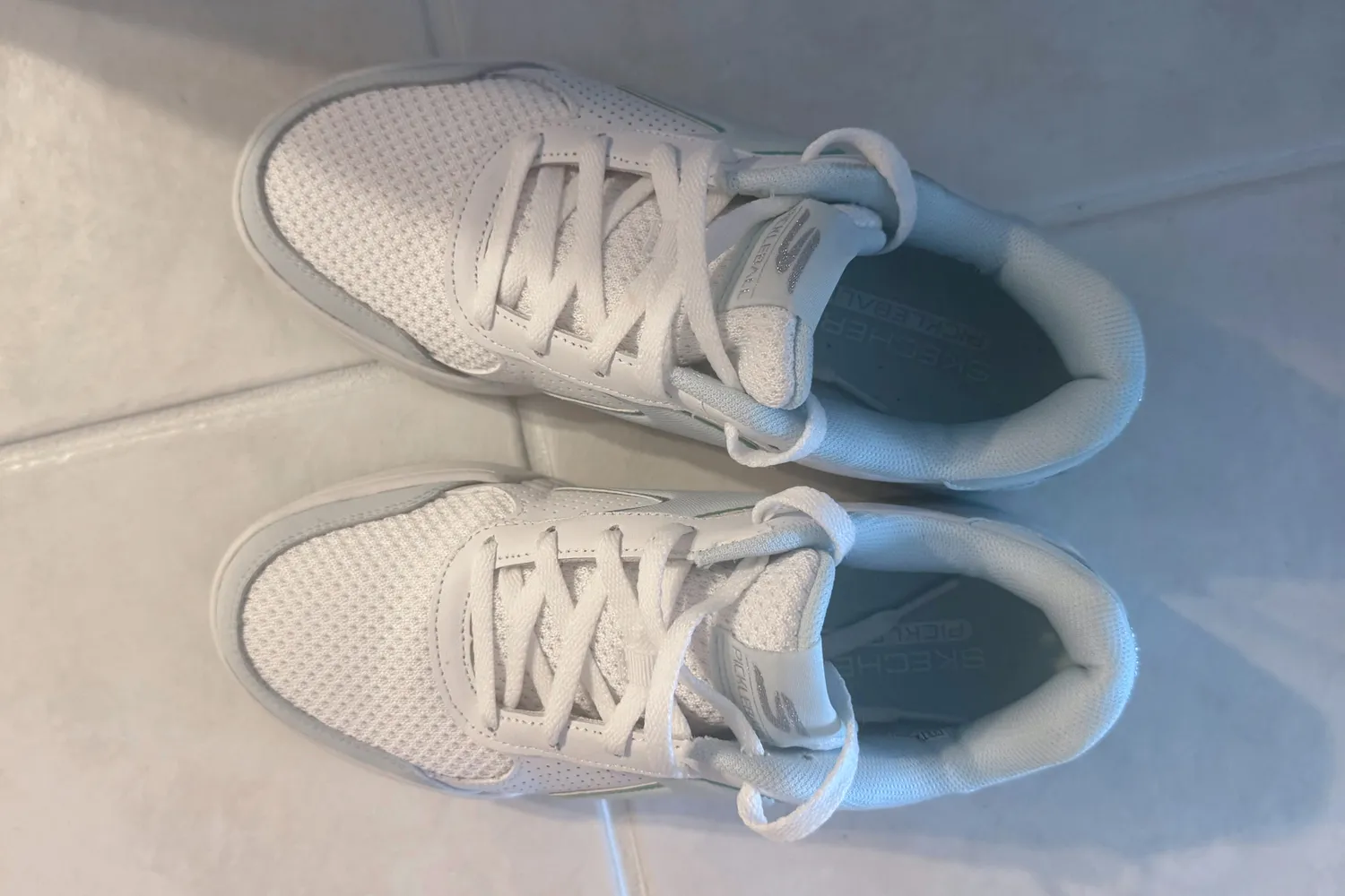 An overhead view of the Skechers Women's Viper Court Classic Pickleball Shoes with the laces untied