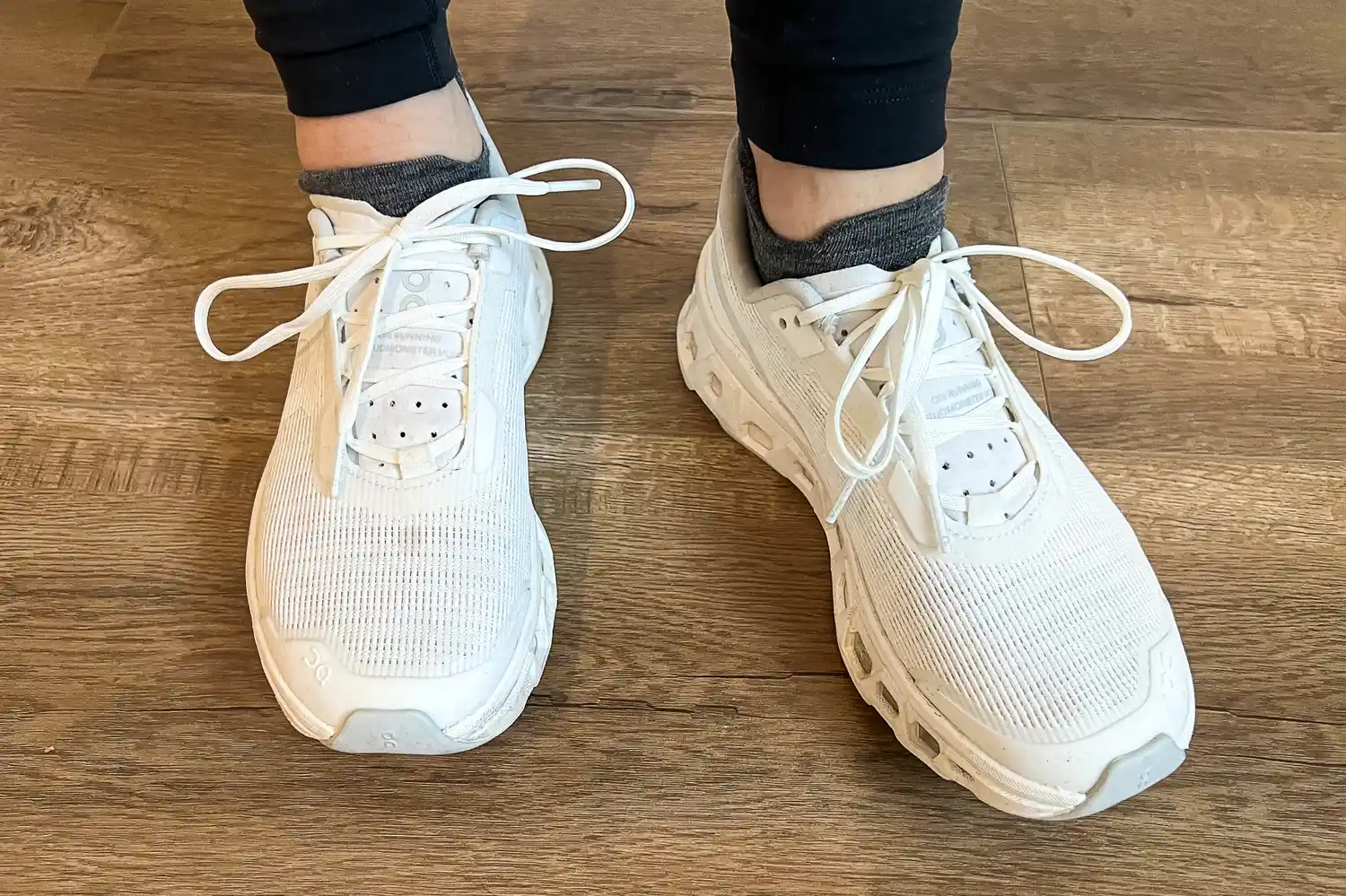 A person wears the Smartwool Run Low Ankle Socks inside sneakers