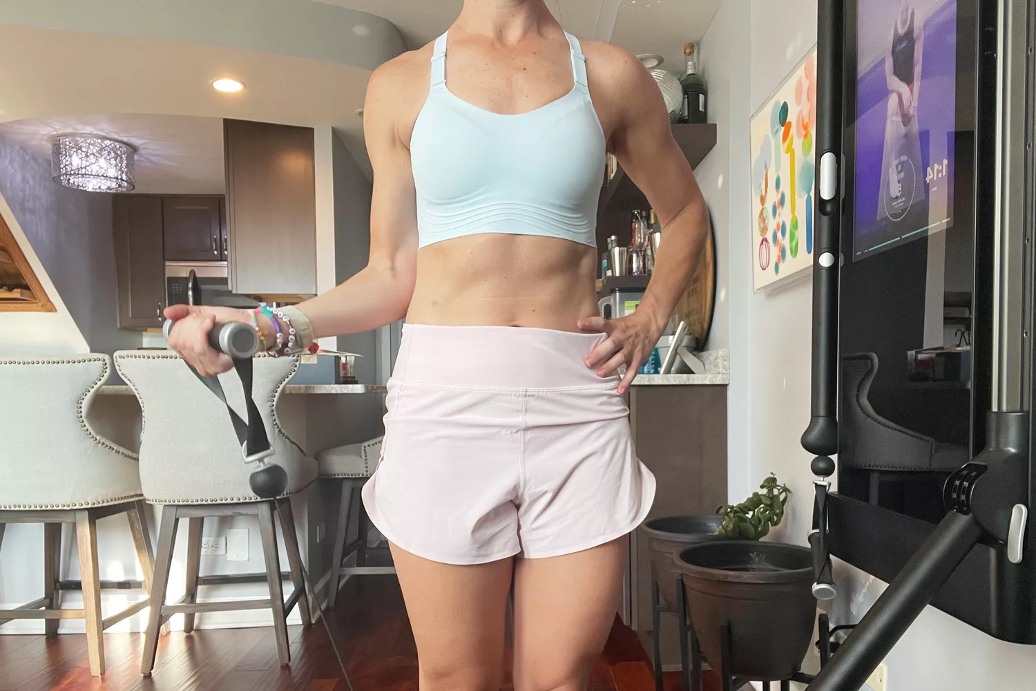 A person exercising in the All in Motion High Support Embossed Racerback Run Sports Bra