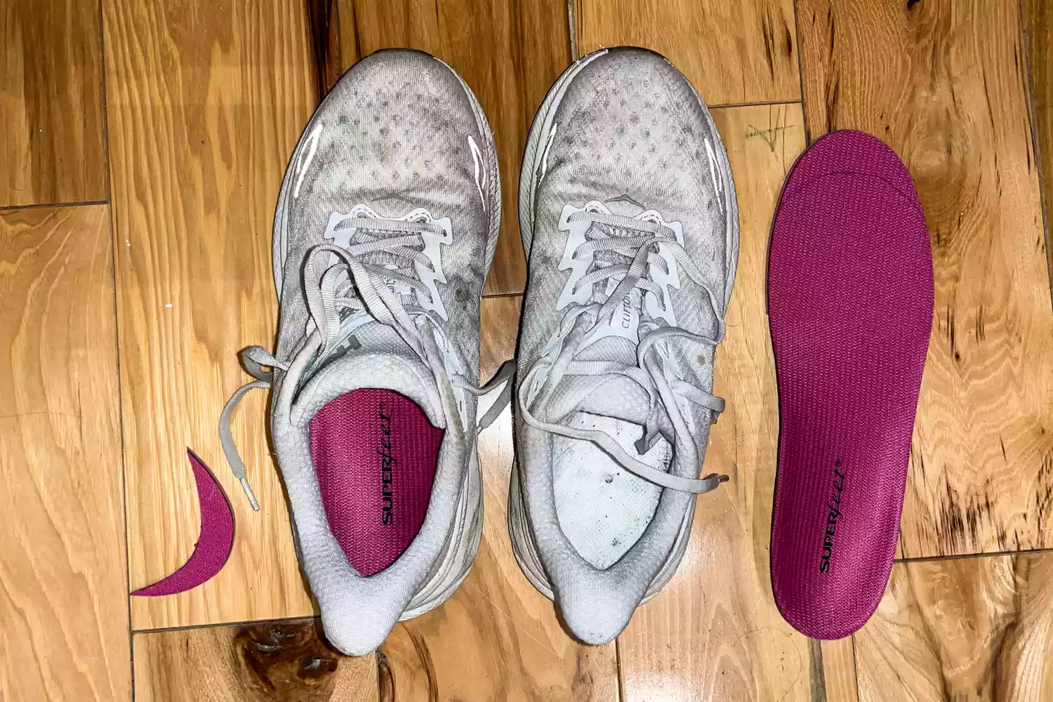 The Superfeet All-Purpose Women's High Impact Support Insole inside a pair of sneakers