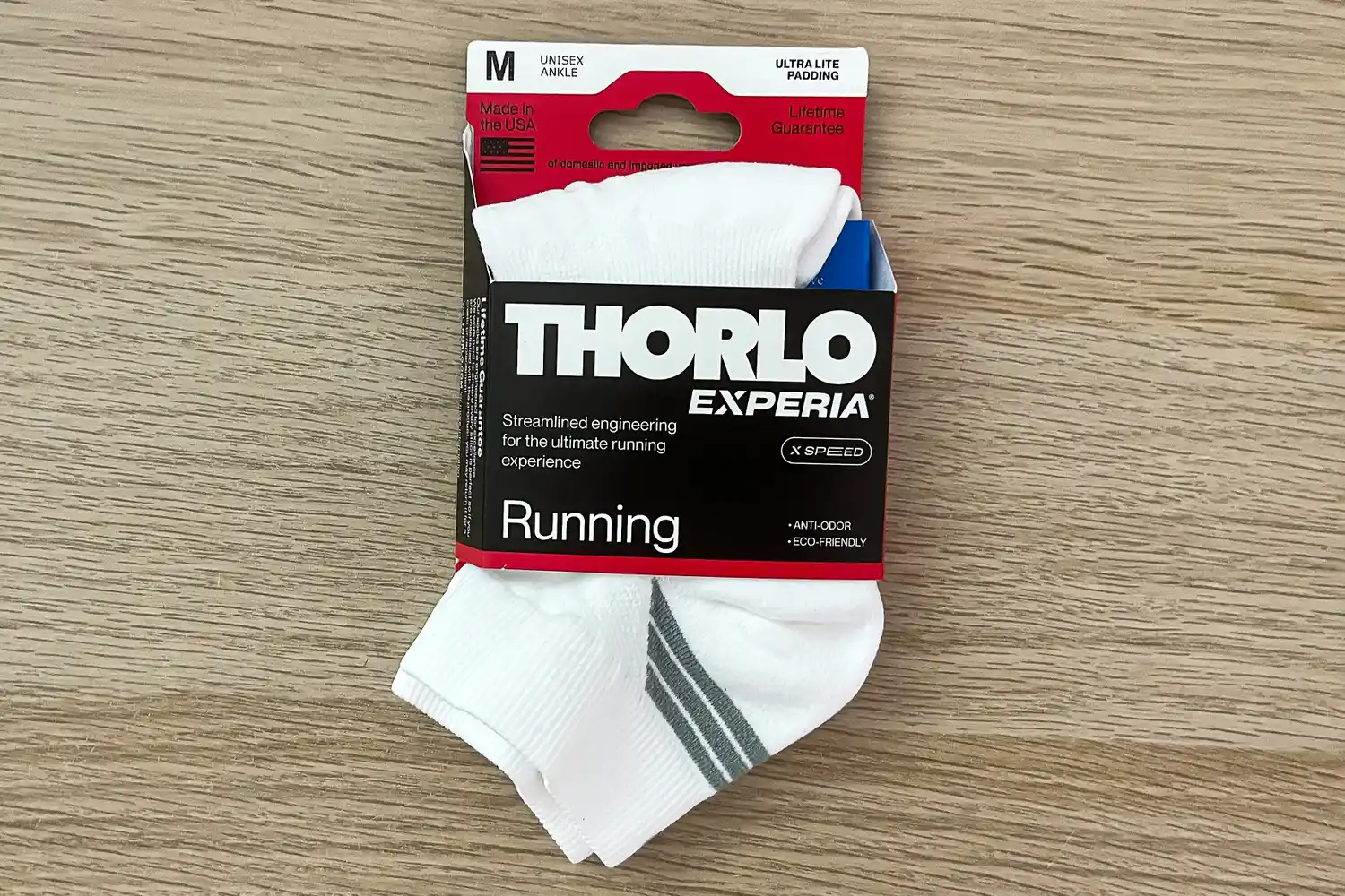 The Thorlo EXRUN003 Experia X SPEED Performance Cushion Ankle Socks in packaging