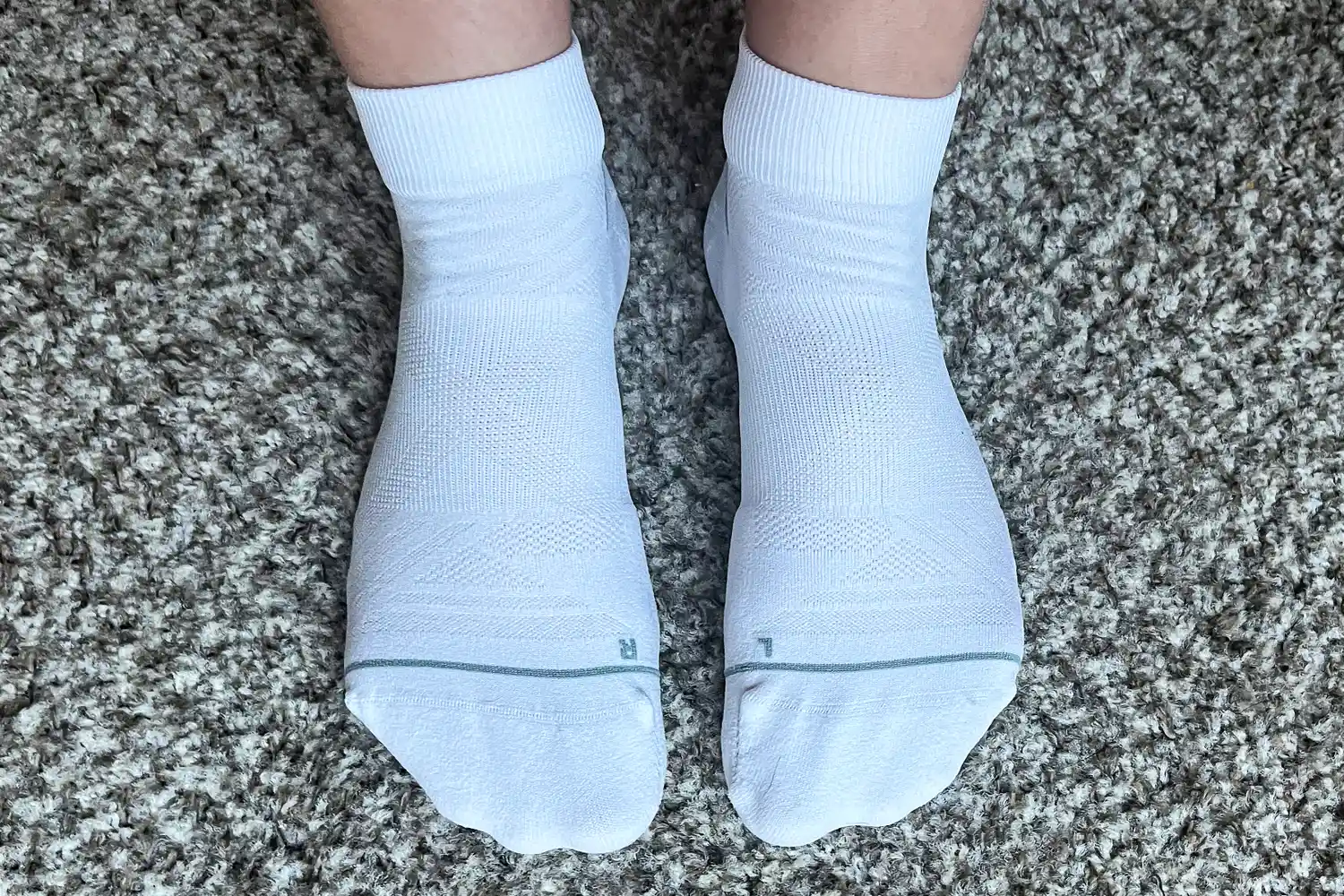 An overhead view of a person wearing the Thorlo EXRUN003 Experia X SPEED Performance Cushion Ankle Socks