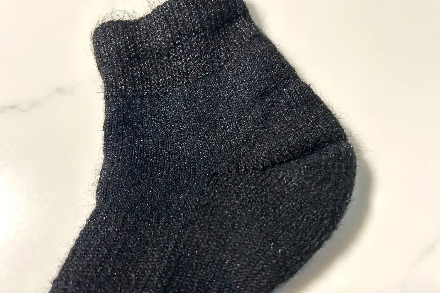 The heel on the Thorlo WMX Moderate Cushion Ankle Walking Sock 