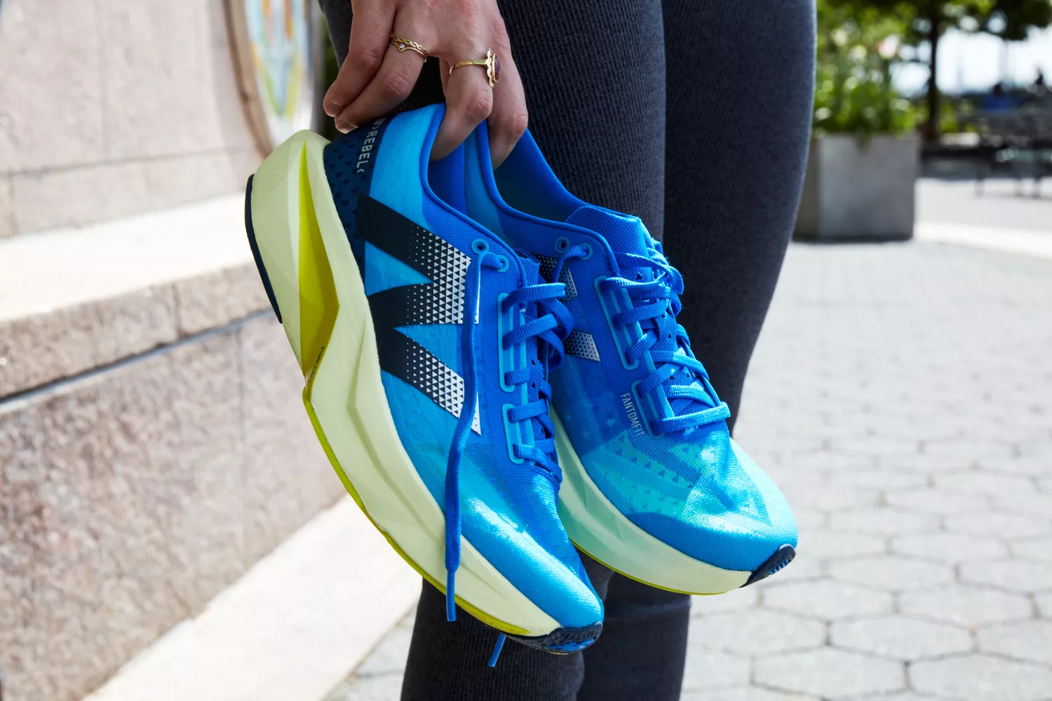 Person holding New Balance Women's Fresh Foam Roav V1