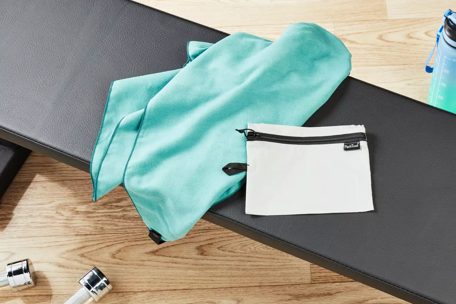 Packtowel microfiber towel on workout bench