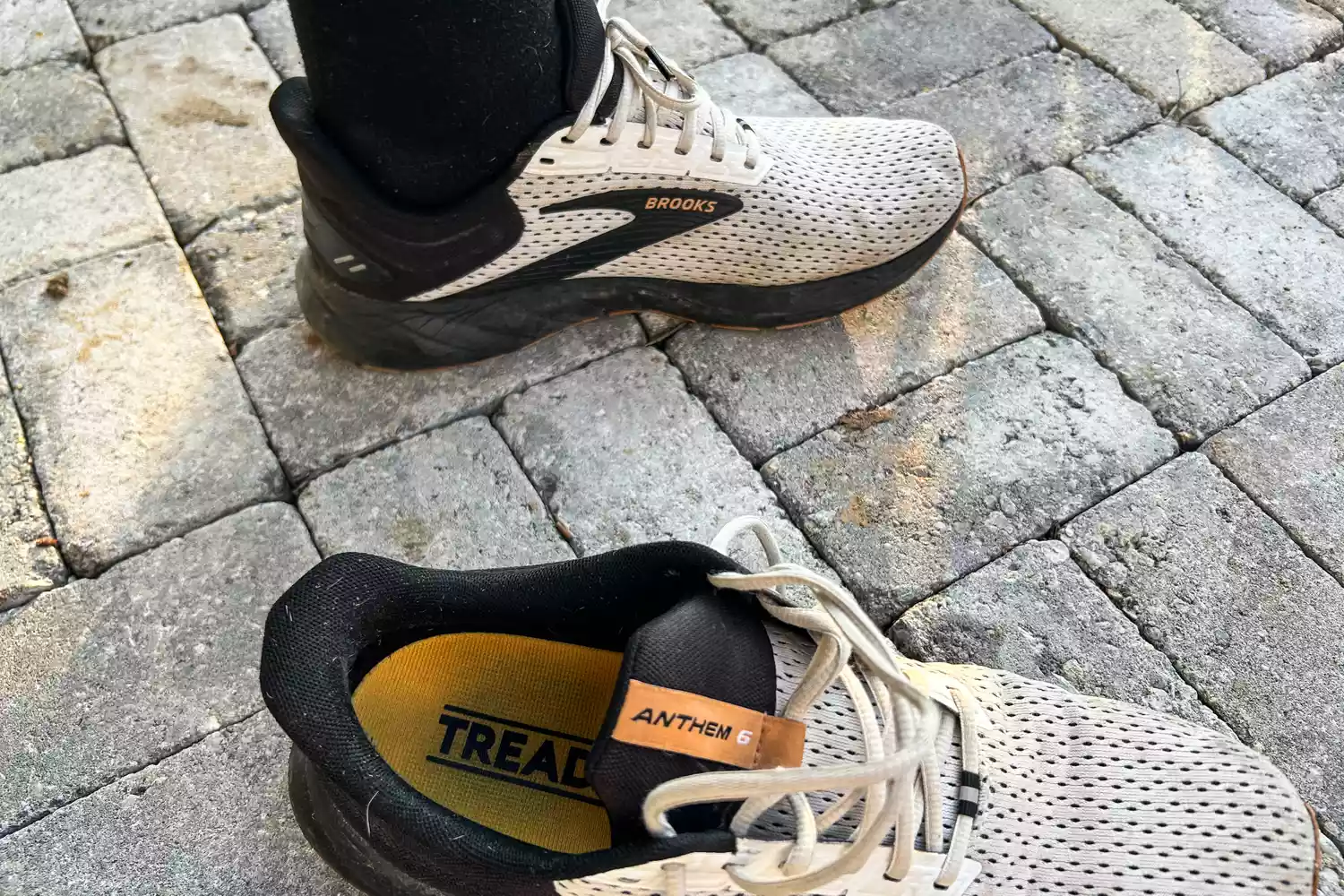 A person wears sneakers with the Tread Labs Dash Insoles inside