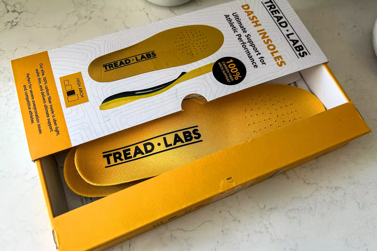 The Tread Labs Dash Insoles in their box