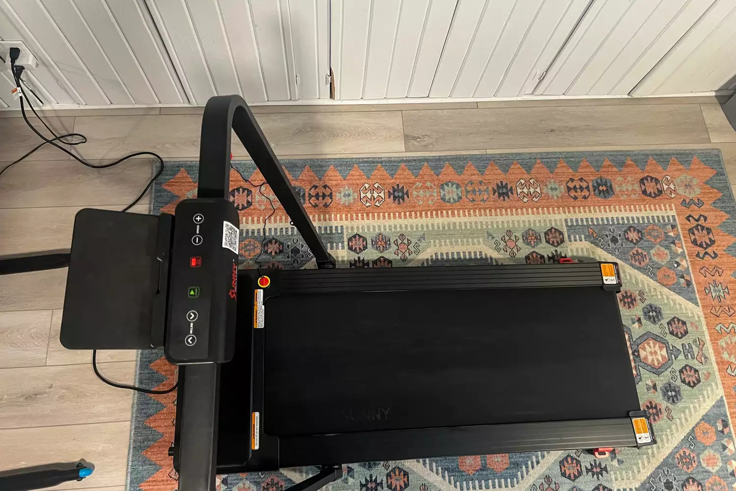 The Sunny Health & Fitness Pacer Smart Compact Auto Incline Treadpad Treadmill after assembly