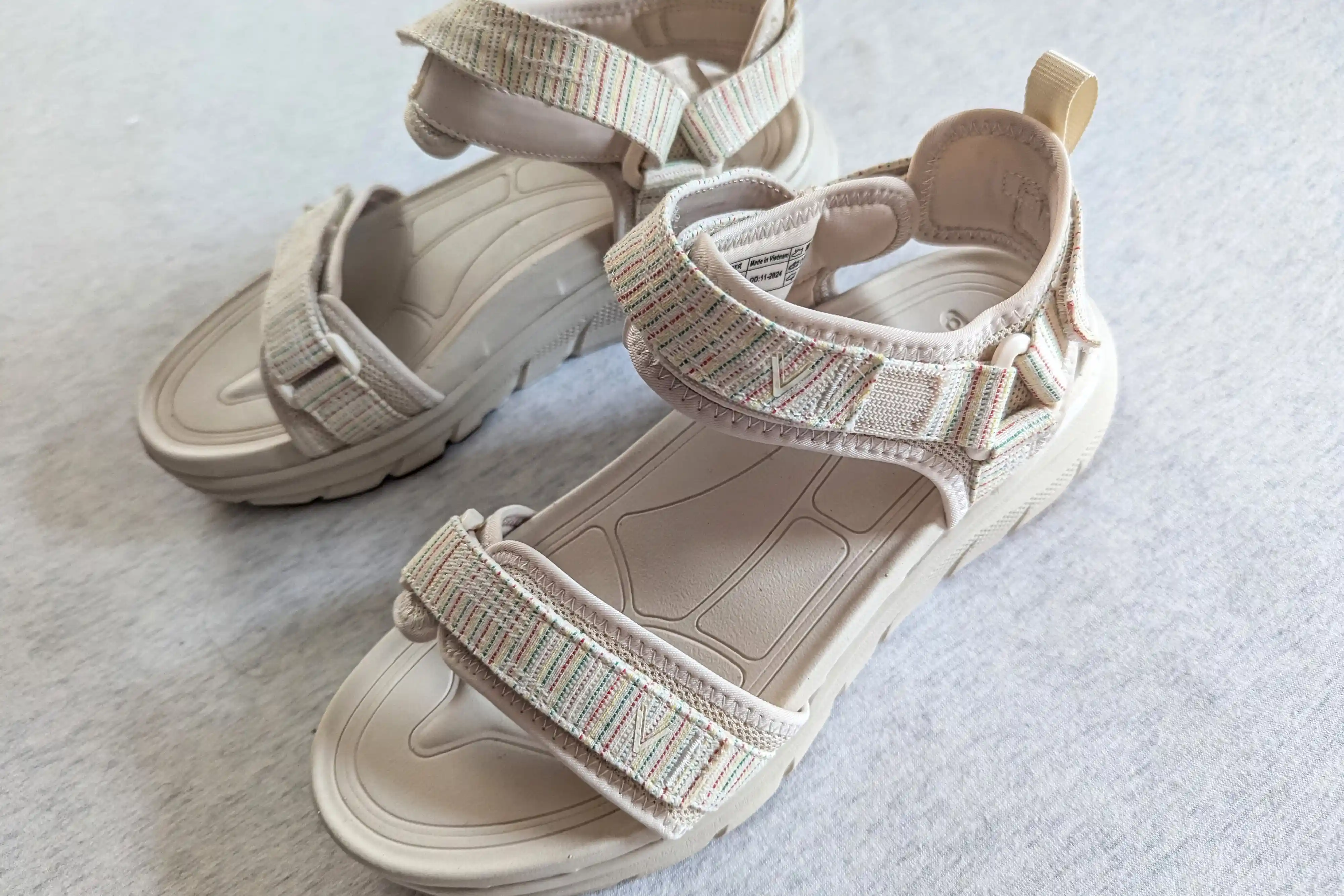 The Vionic Walk Max Wanderer Sandal on a gray surface