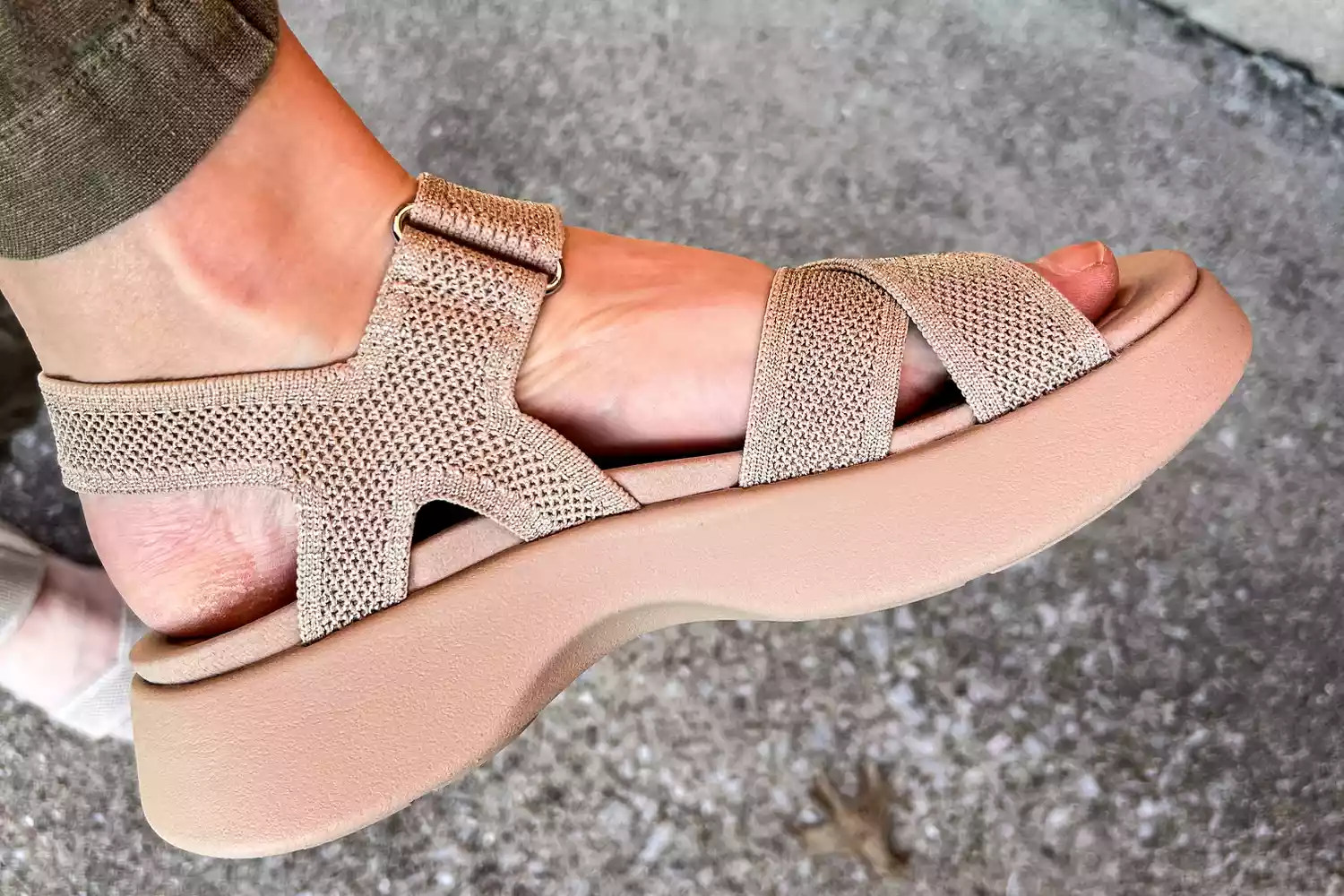 A close-up of a foot wearing a Vivaia Kiara Sport Sandal