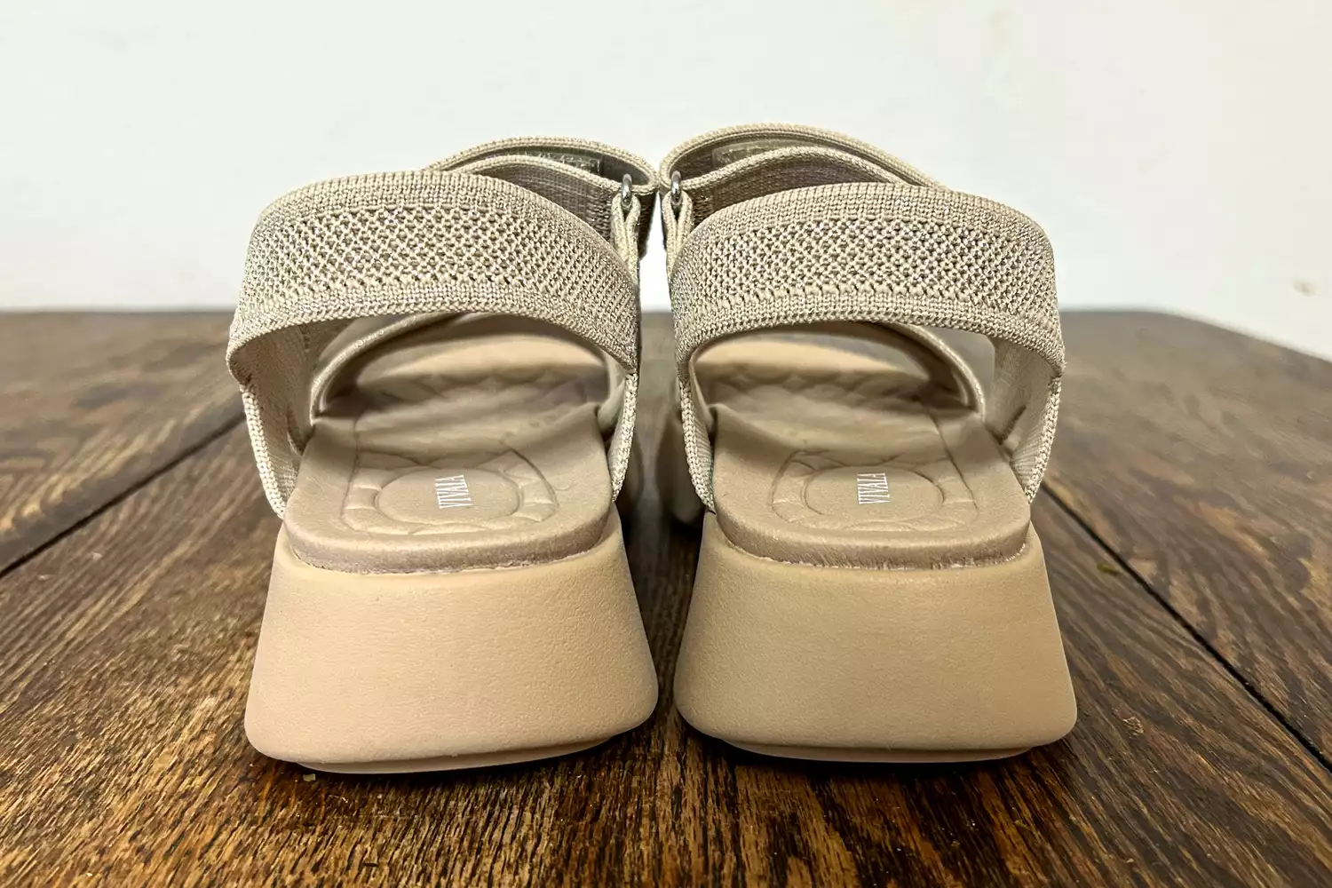 The back of the Vivaia Kiara Sport Sandals on wood