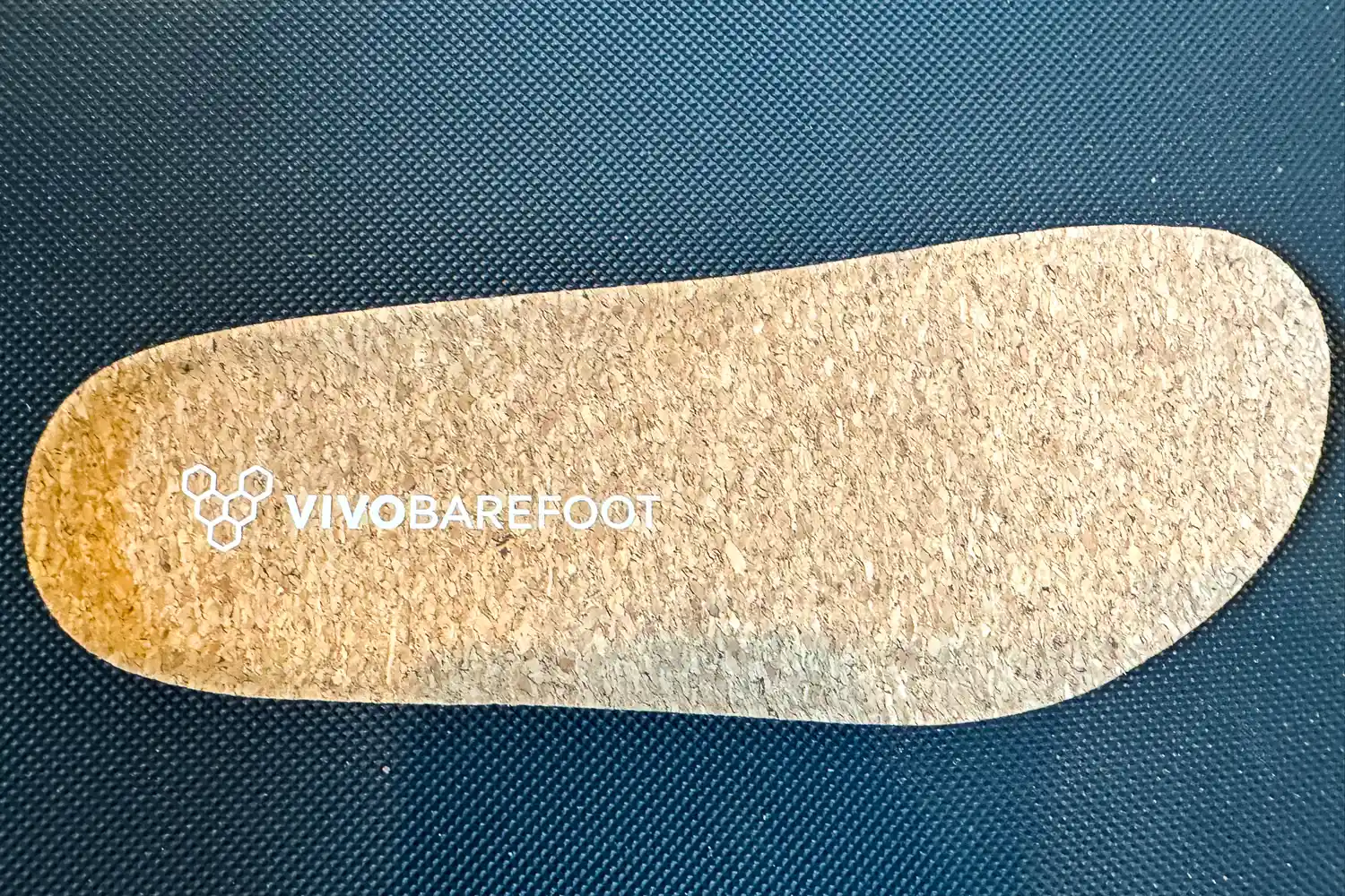 The cork insole for the Vivobarefoot Women's Primus Lite Knit Natural Sneaker