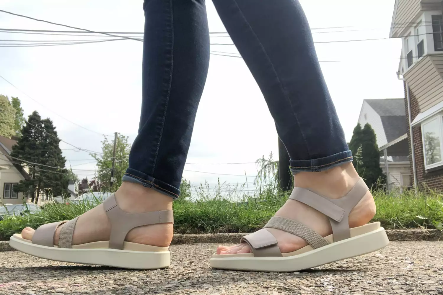 Person walking on road wearing ECCO Women’s Flowt Sandal