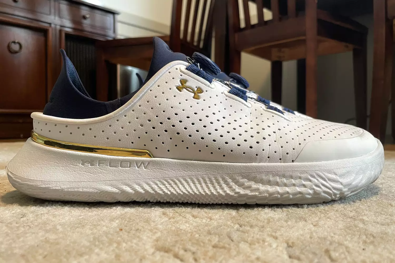 A side view of the Under Armour Unisex UA SlipSpeed Training Shoes