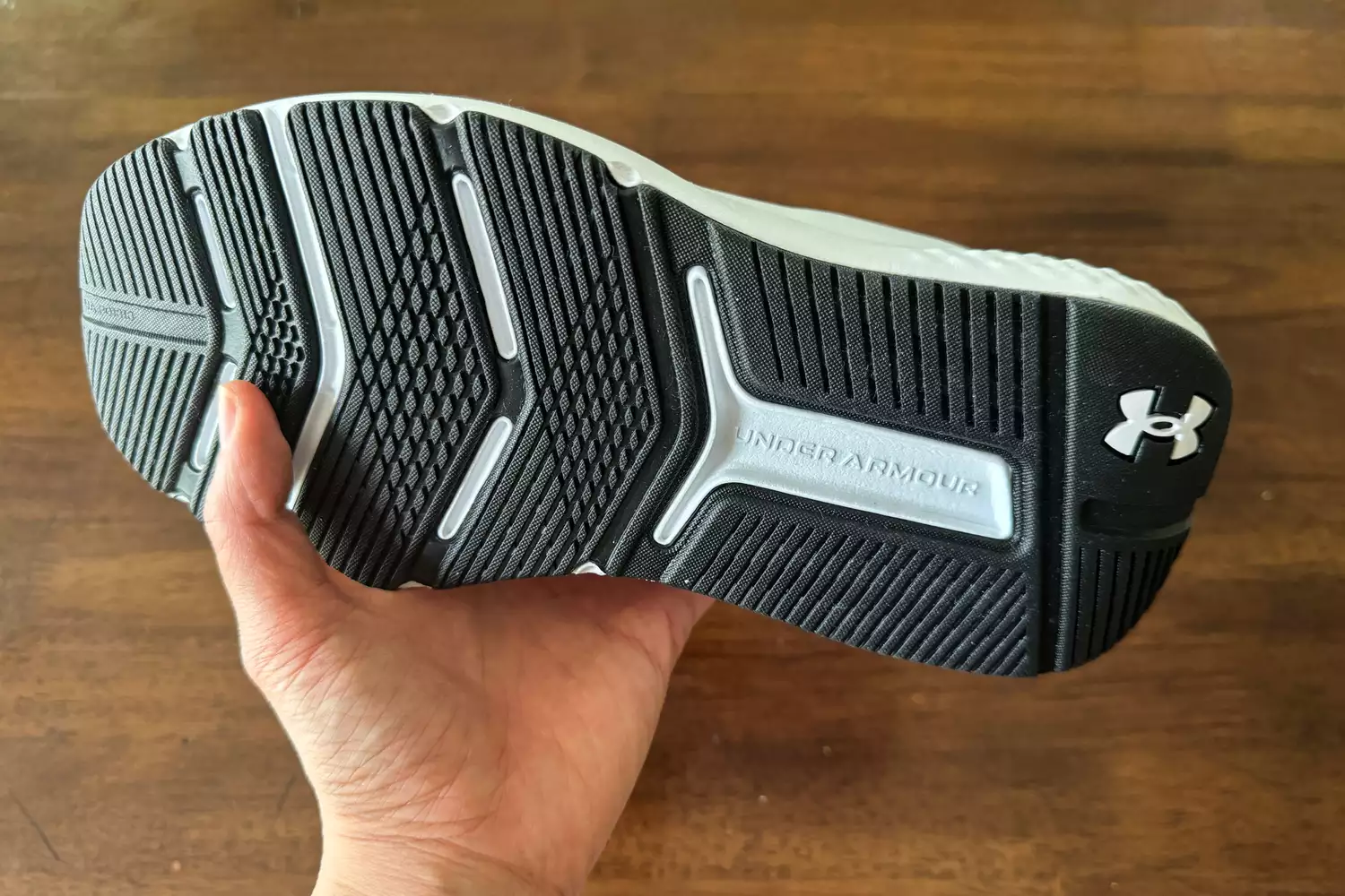 The bottom treads on the Under Armour Women's UA Commit 4 Training Shoes