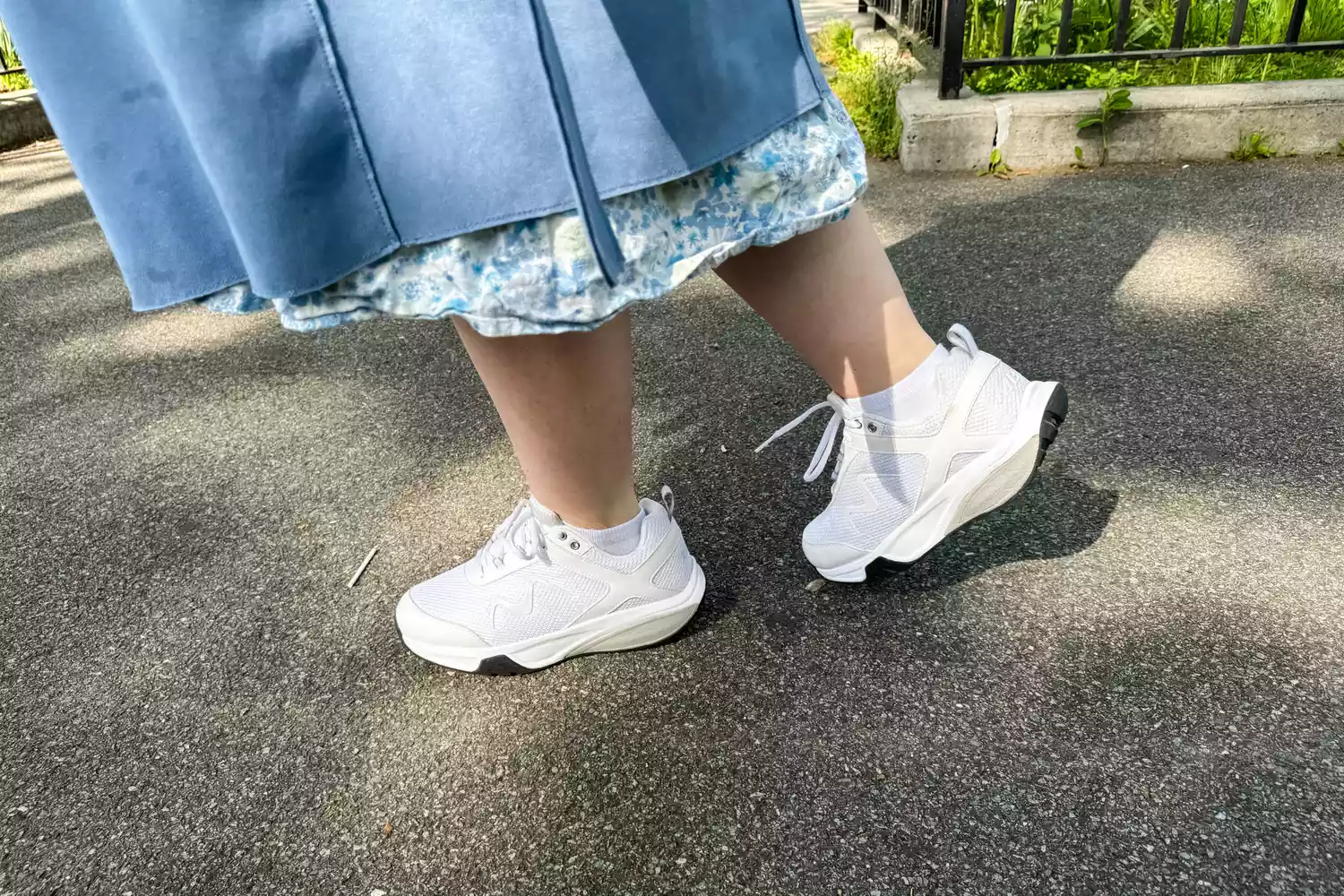 A person waling on black top in MBT Women&acirc;s Sport 4 II shoes