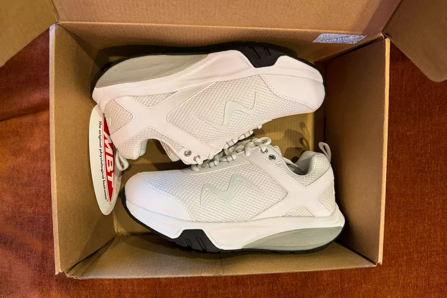 The MBT Women&acirc;s Sport 4 II sneakers in a box