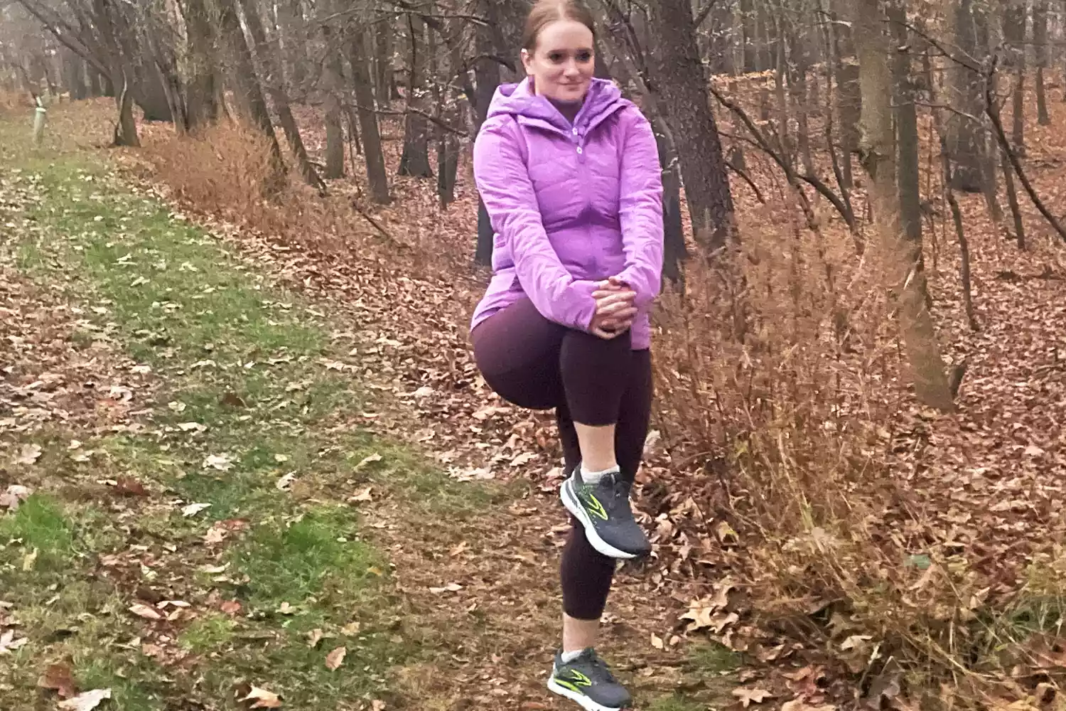Person stretching while wearing lululemon Womens Another Mile Jacket
