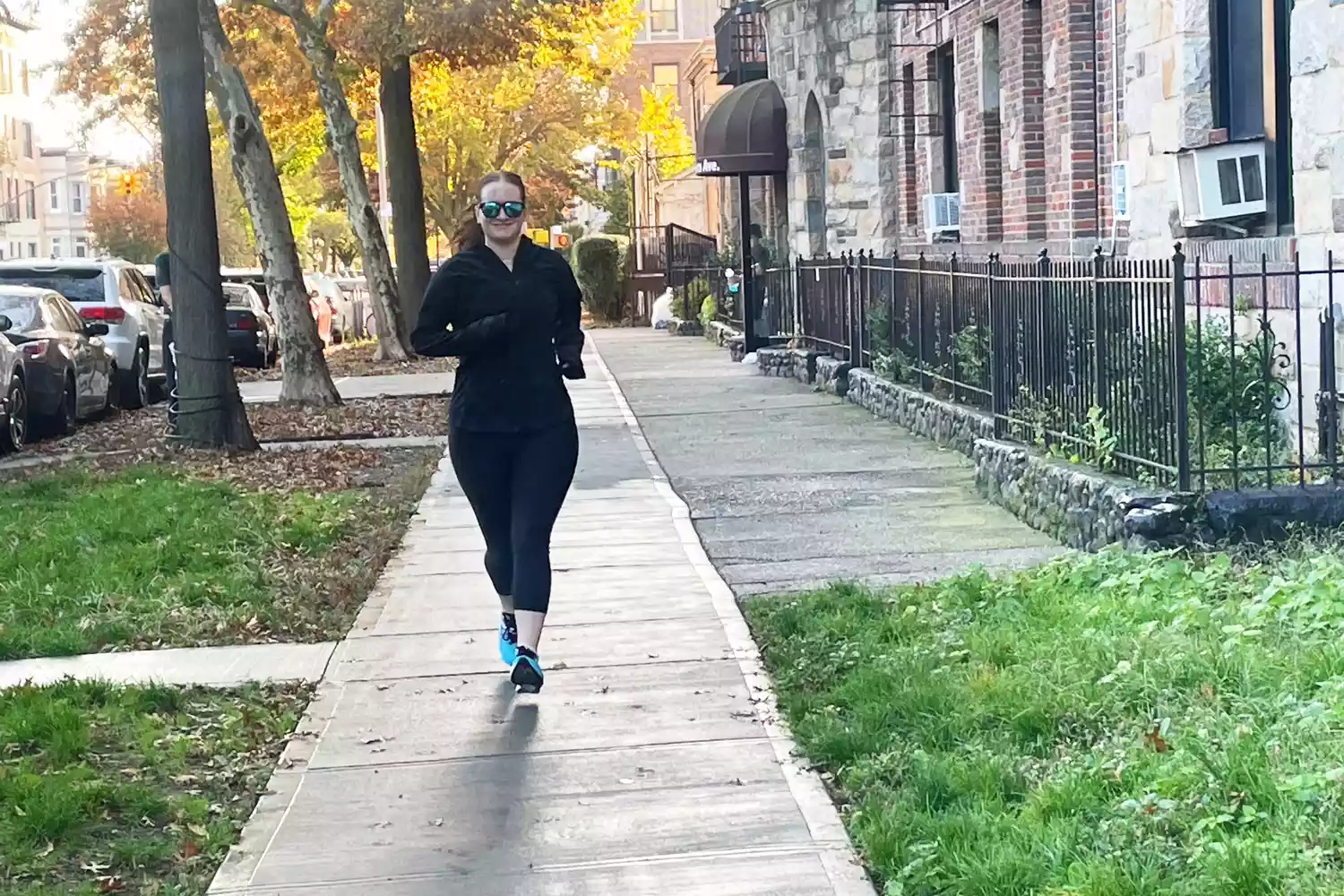 Person running wearing Lululemon Mist Over Windbreaker