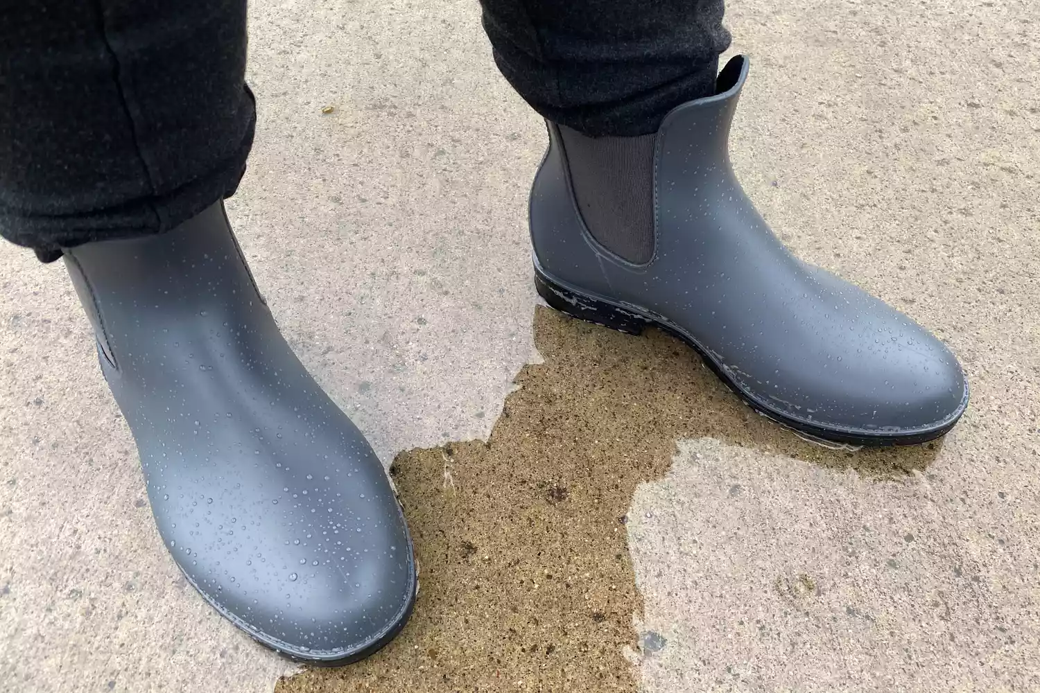 A person wears the Asgard Chelsea Ankle Waterproof Rain Boots 