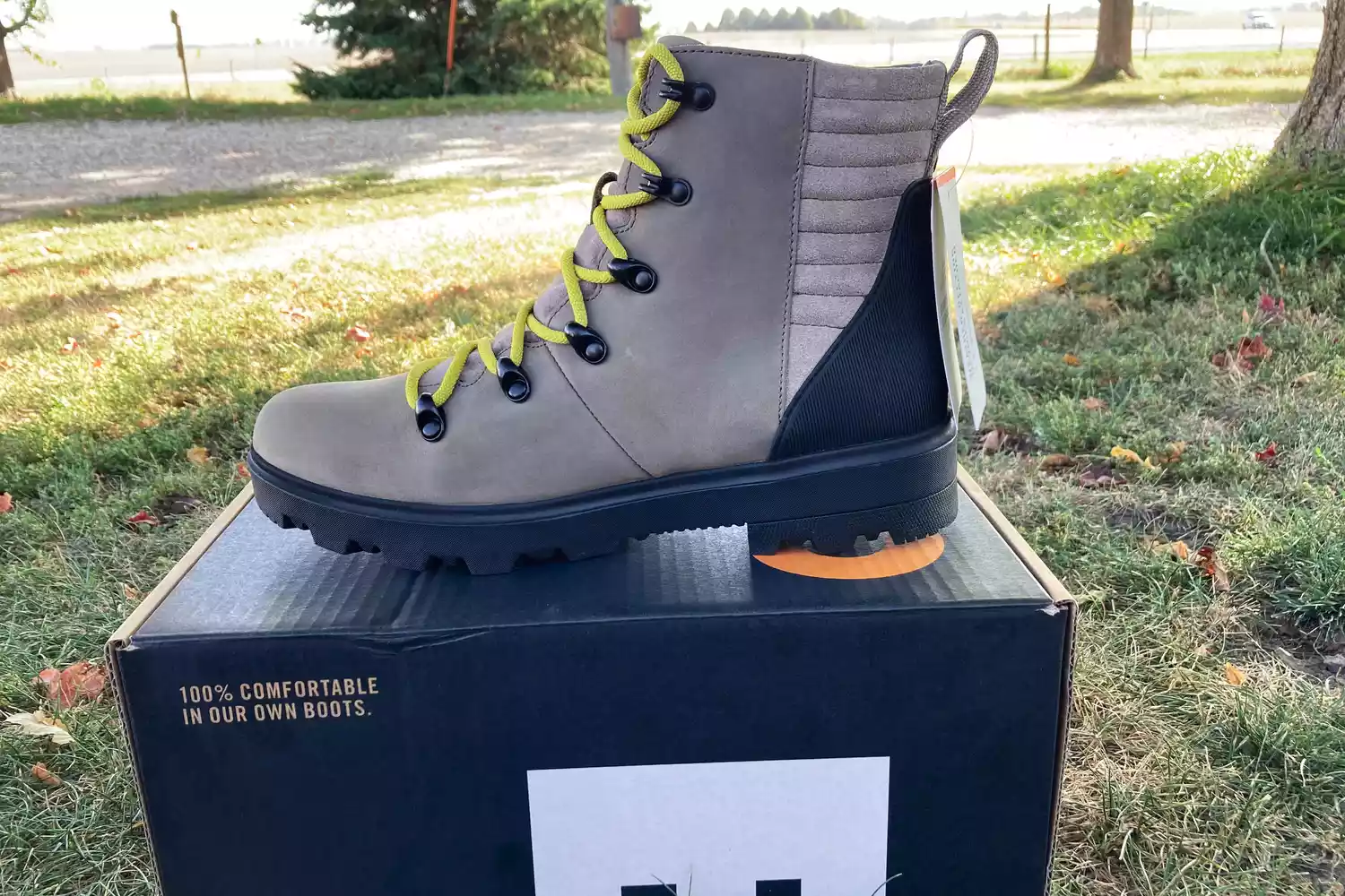 The Bogs Holly Lace Leather Boot displayed on its box