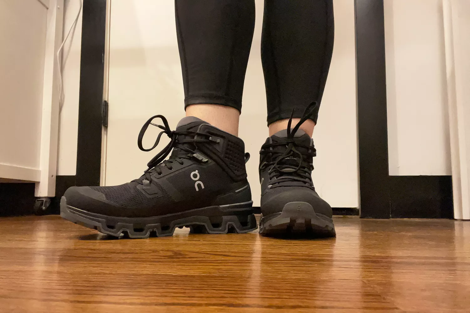A person wear the On Cloudrock 2 Waterproof Boots