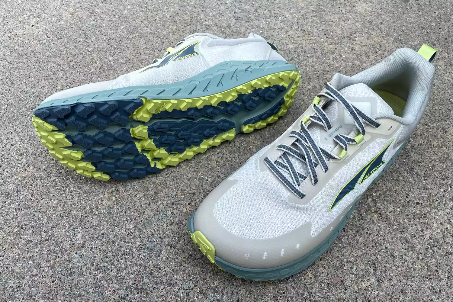 Two Altra Outroad 2 sneakers posed outdoors