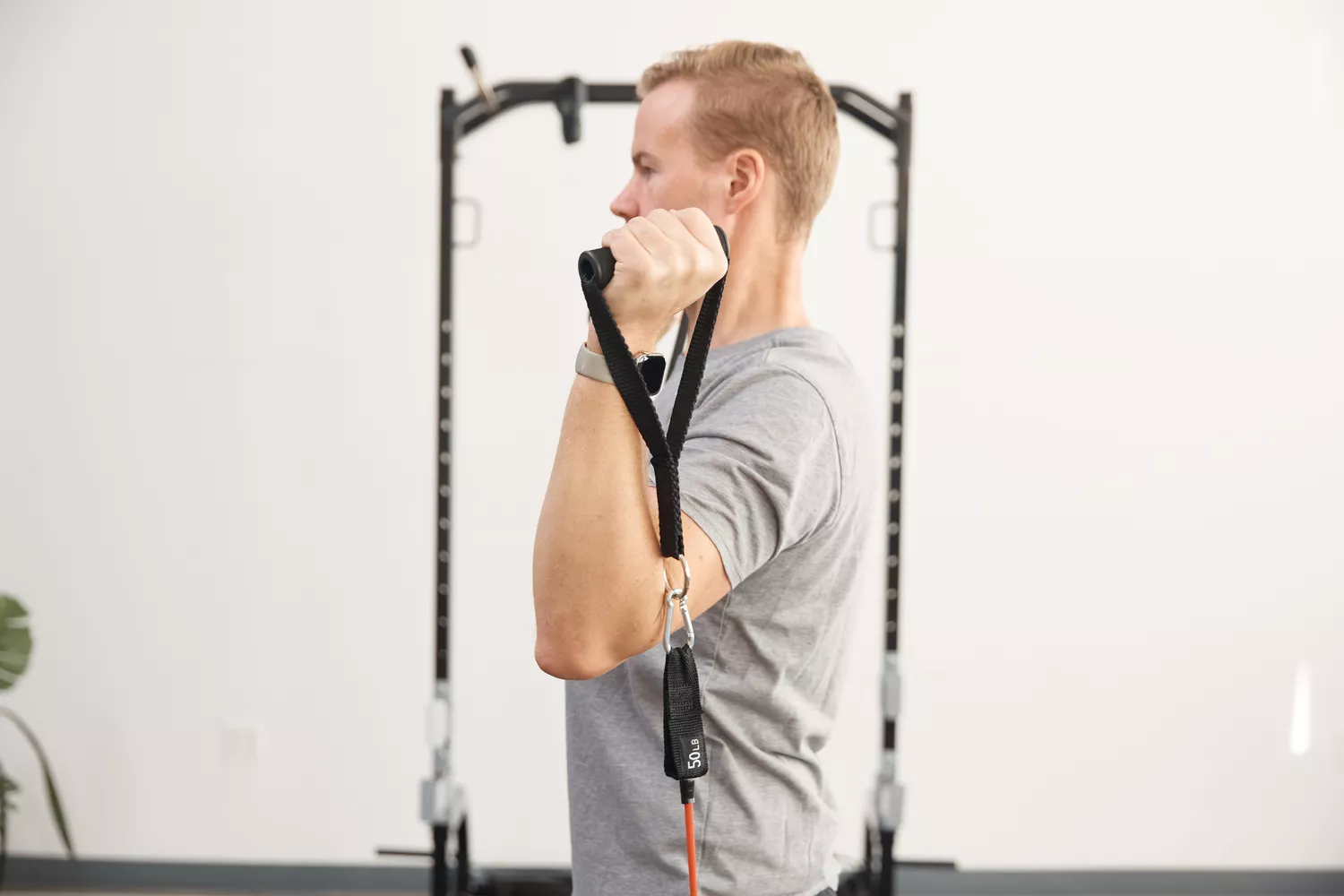 Person using Whatafit Resistance Bands Set to work upper body