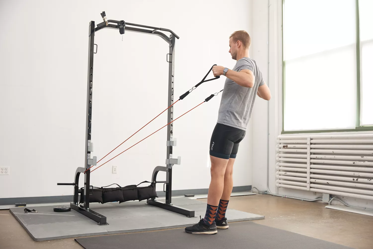 Person using Whatafit Resistance Bands Set to work upper body
