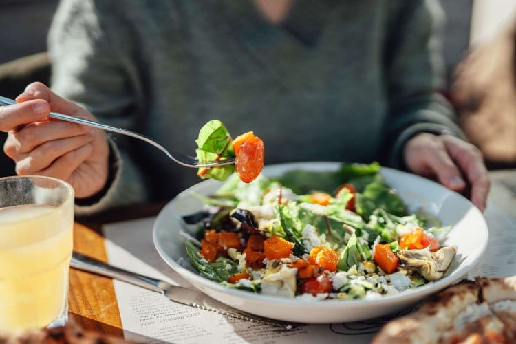 Woman eating a salad