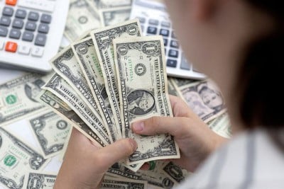 Column-Funds ramp up long dollar, short Treasuries bets: McGeever