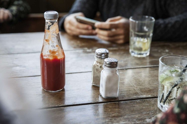 Salt and pepper shaker on table