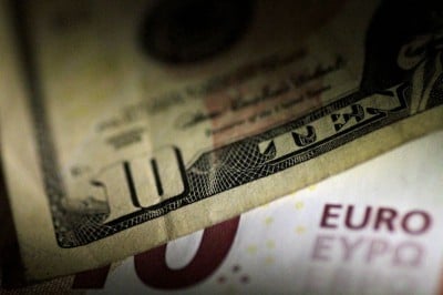 Dollar firm, euro at three-week lows as rate cut bets rise