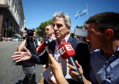 Argentina devalues peso, cuts spending to treat fiscal deficit 'addiction'