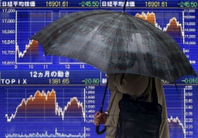 Nikkei ends at 34-year high on tech gains, weaker yen
